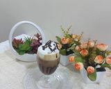 A picture of step 9 of Caramel hot coffee chocolate with cream.