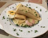 Foto del paso 12 de la receta: Crepes rellenos de picada de pescado y marisco con salsa al cava