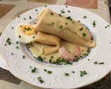 Foto del paso 12 de la receta: Crepes rellenos de picada de pescado y marisco con salsa al cava
