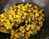 A picture of step 4 of Roti with brinjal aloo fry.