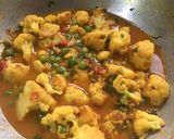 A picture of step 6 of Cauliflower Peas Curry.