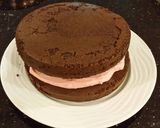 A picture of step 16 of Dark Chocolate Layer Cake with Fresh Strawberry Cream Frosting and Filling.