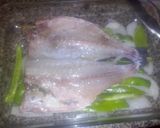 Foto del paso 5 de la receta Dorada al horno con cebolla y pimientos