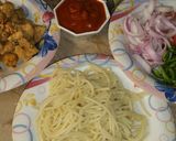 A picture of step 1 of Mini pizza with speghetti.