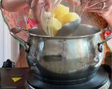 A picture of step 3 of Cambodian fish and pineapple soup.