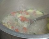 A picture of step 2 of Rice Chicken vegetable soup.
