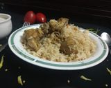 A picture of step 7 of Chicken Steam Pulao.