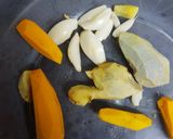 A picture of step 9 of Roast potatoes, carrots served with cabbage and kachumbari.