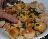 A picture of step 18 of Garlic knots.