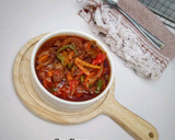 A picture of step 7 of Shredded beef sauce with veggies.