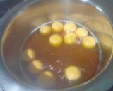 A picture of step 3 of Orange flavoured Rasgulla.
