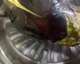 A picture of step 2 of Baingan ka bharta (with roasting method).