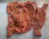 A picture of step 4 of Vegetable stuffed orange beef.
