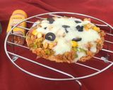 પનીર ચીઝી ભાખરી પીઝા (Paneer Cheesy Bhakhri Pizza Recipe In Gujarati) રેસીપી સ્ટેપ5ફોટો