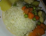 صورة لخطوة 3 من وصفة سمك فيليه بالخضار مع أرز بالبهارات والهيل