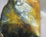 Foto langkah ke 1 dari resep Ikan Mas Kemangi Rempah Kunyit.