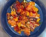 A picture of step 10 of Blackened chicken with caramel and clementine dressing.