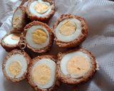 A picture of step 6 of Scotched eggs.