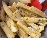 Foto del paso 3 de la receta: Tosta de Pisto Manchego, Huevo plancha & Bastones de Patata al horno