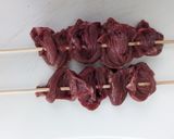 A picture of step 2 of Chicken heart kebabs with peanut satay dip.