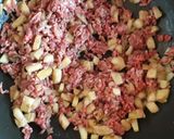 Foto del passaggio 4 della ricetta Melanzane ripiene di carne