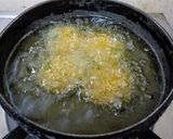 A picture of step 4 of Makai Bajri Ane Methi Na Vada.