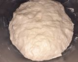 A picture of step 2 of Chocolate icing doughnuts.