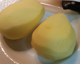 Foto del paso 2 de la receta: Huevos con base de patatas y virutas de jamón
