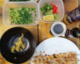 A picture of step 1 of Grilled prawns with egg wild fried rice and samphire.