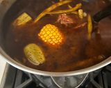 A picture of step 7 of Mole de Olla.