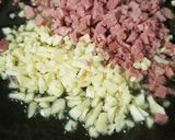 A picture of step 2 of Aglio Olio and Corned Beef bits.