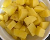 A picture of step 1 of Achari Dum Aloo.