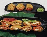 A picture of step 6 of Arbi leaves Paneer pocket fritters.