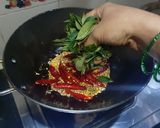 A picture of step 2 of Karivepaku karam podi curry leaves powder Andhra style.