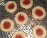 A picture of step 3 of Strawberry Thumbprint Cookies.