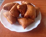 A picture of step 7 of Crunchy coconut Mandazi.