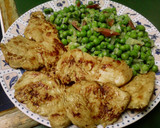 Foto del paso 4 de la receta: Solomillo de pavo macerado y guisantes con jamón