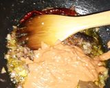 A picture of step 9 of Kashmiri dum aalo.
