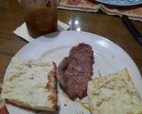 Foto del paso 3 de la receta: Salchicha criolla y churrasco de cuadril a la chapa
