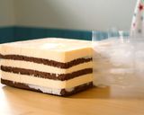 A picture of step 16 of Tiramisu, and Cocoa Sponge with plenty of Coffee Syrup.
