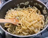 Une image de l'étape 12 de Macaronis aux oignons, ail, Boursin®️ et jambon cru.