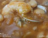Foto del paso 12 de la receta: Judías blancas con langostinos y chirlas enfadadas