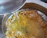 A picture of step 4 of Odia style moong dal khichdi.