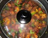 A picture of step 6 of Chicken 65.