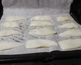 Foto del paso 3 de la receta: Chipirones al grill con ajo y perejil