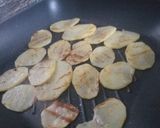 A picture of step 5 of Fish pakoras with grilled potatoes.