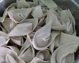 Foto langkah ke 5 dari resep Pangsit Isi Ayam Sayuran.