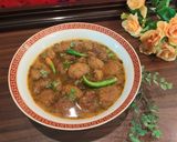 A picture of step 6 of Moong daal Mangochian (fried lentils balls in curry).