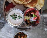 A picture of step 11 of Masala Puri cucumber raita and chole.