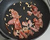 A picture of step 5 of Ocean Blue Pasta with Toasted Pine Nuts and Parmesan.